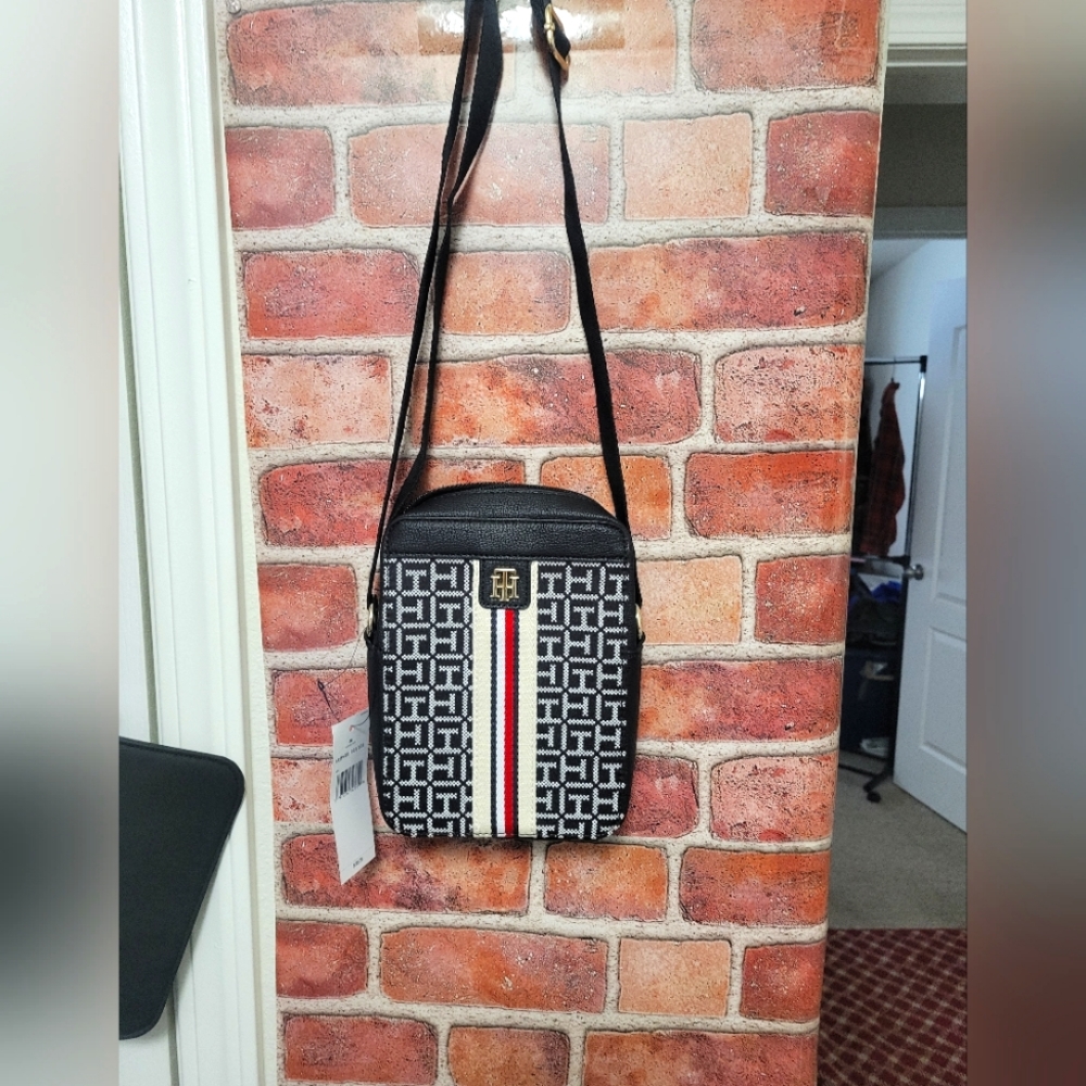 Tommy Hilfiger branded crossbody bag. NWT. Adj. Strap. Canvas/leather.